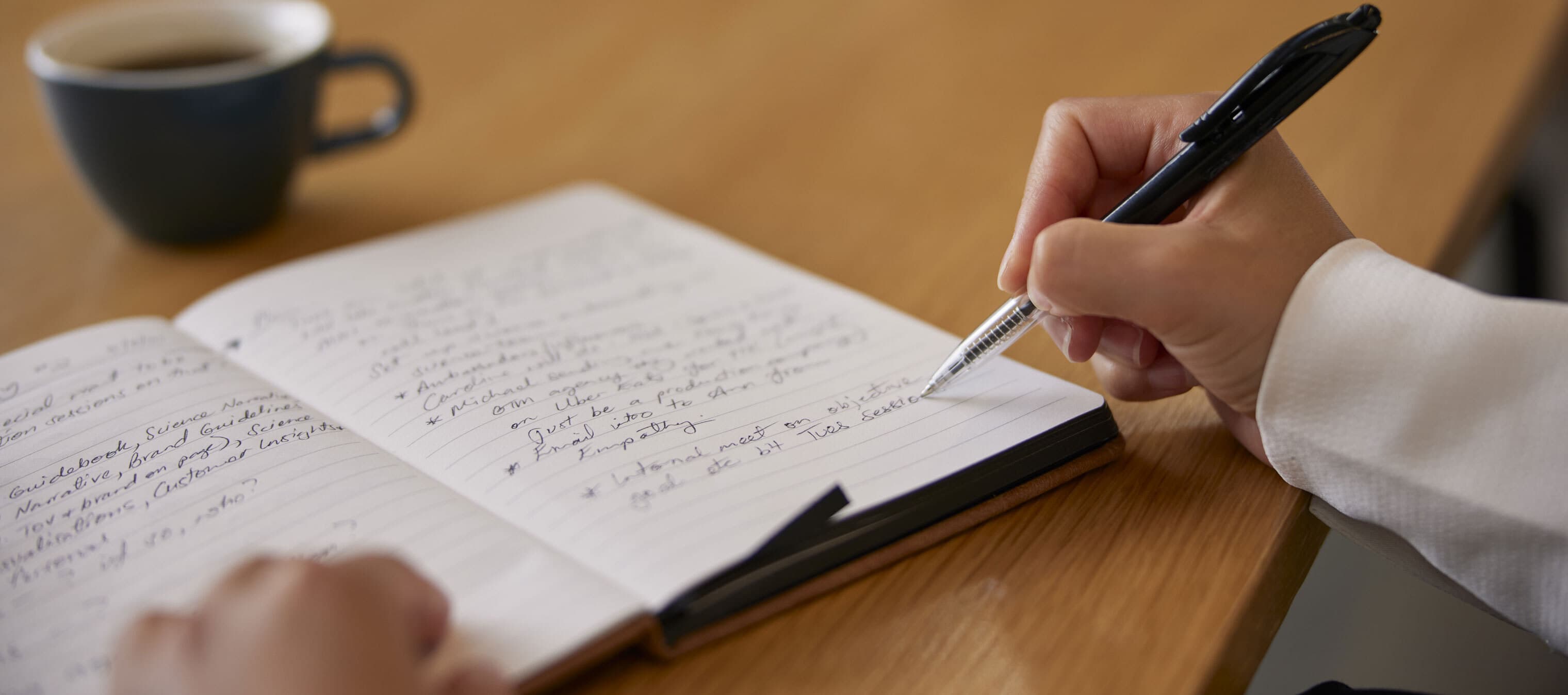 a scientist writing in his journal